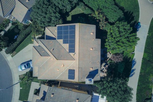 A photograph of a large house taken from above.